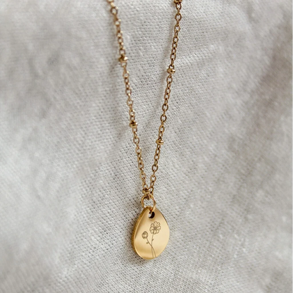 Gouden geboortebloem ketting – een betekenisvol cadeau per maand