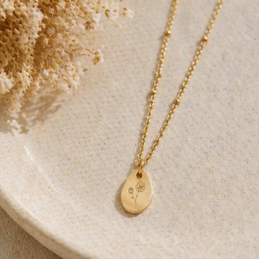 Gouden geboortebloem ketting – een betekenisvol cadeau per maand